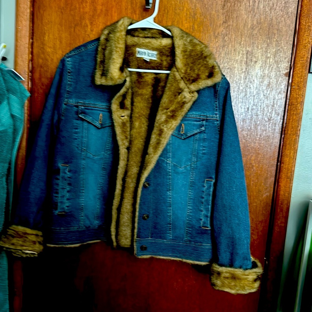 Women’s jeans jacket with faux fur lining. Great condition
